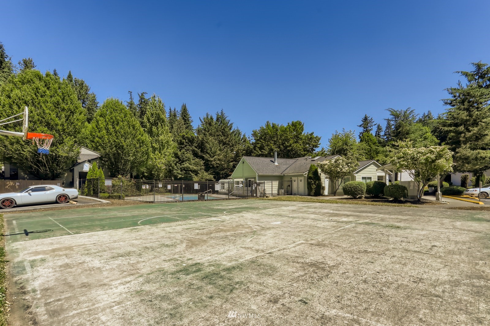 9805 Avondale Road Northeast, Unit X162 Redmond, WA 98052 - Photo 15 of 19 a front view of a house with a yard and trees