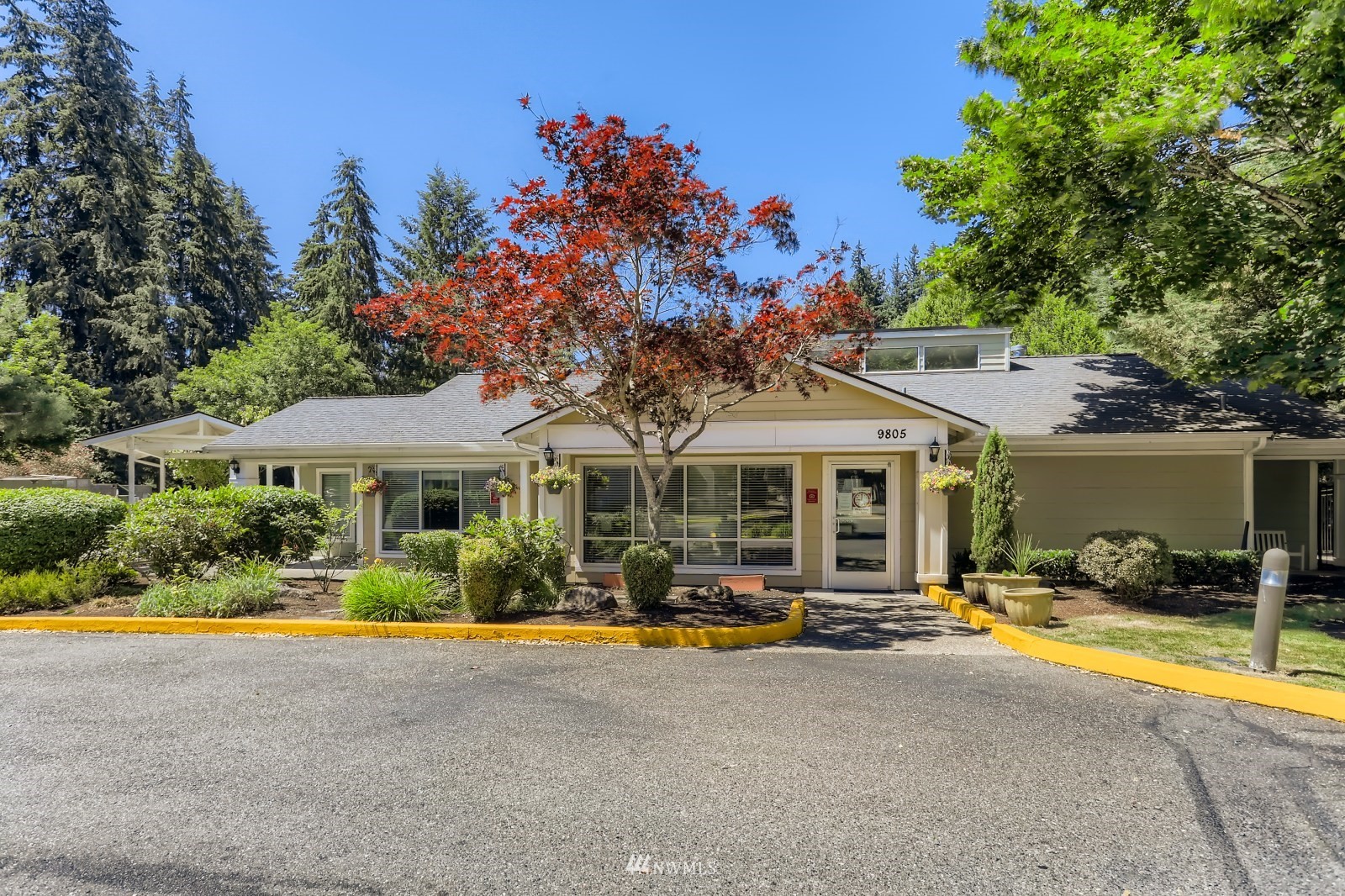 9805 Avondale Road Northeast, Unit X162 Redmond, WA 98052 - Photo 16 of 19 a front view of house with yard and outdoor seating