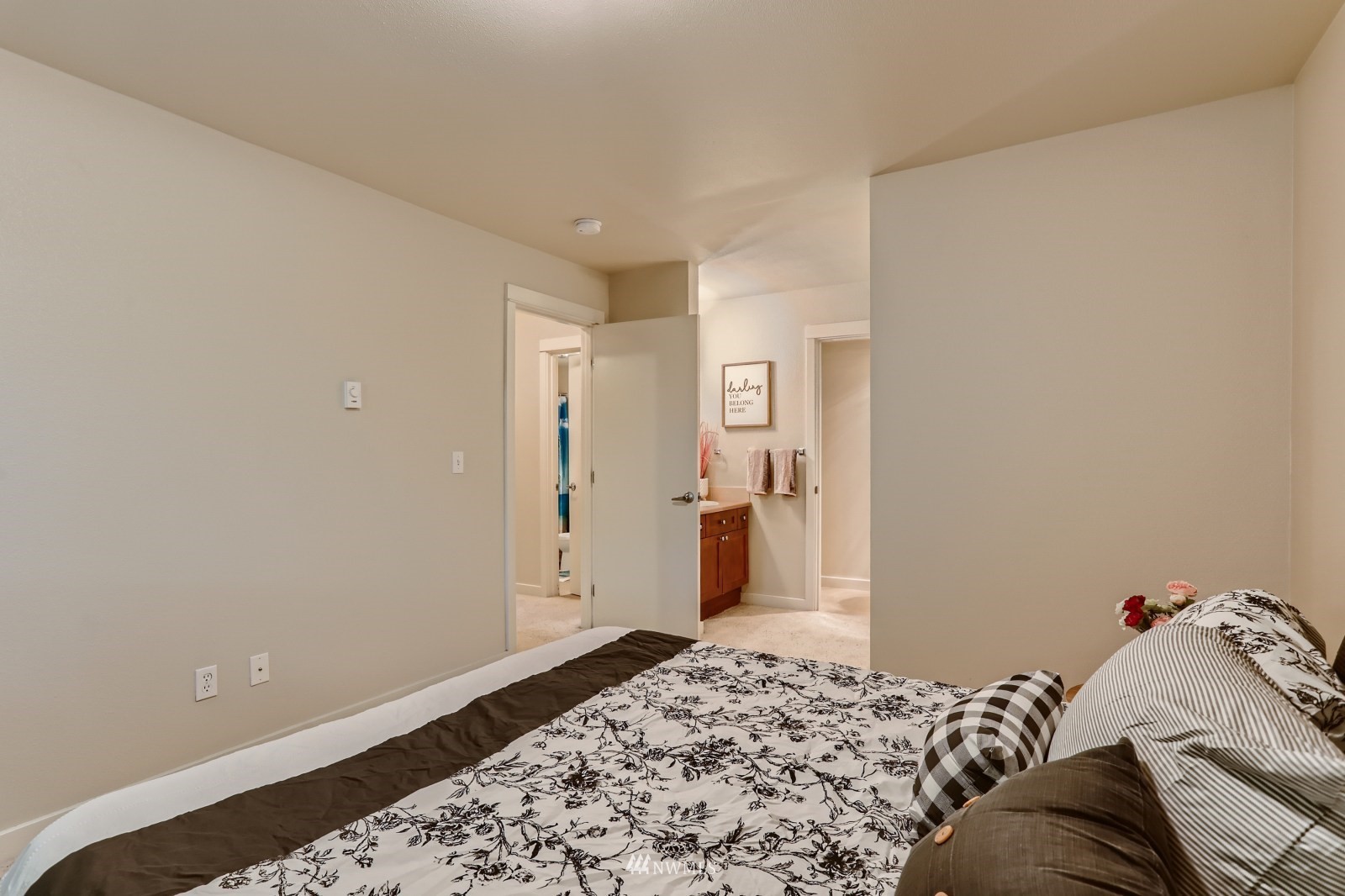 9805 Avondale Road Northeast, Unit X162 Redmond, WA 98052 - Photo 7 of 19 a bedroom with a bed and wooden floor