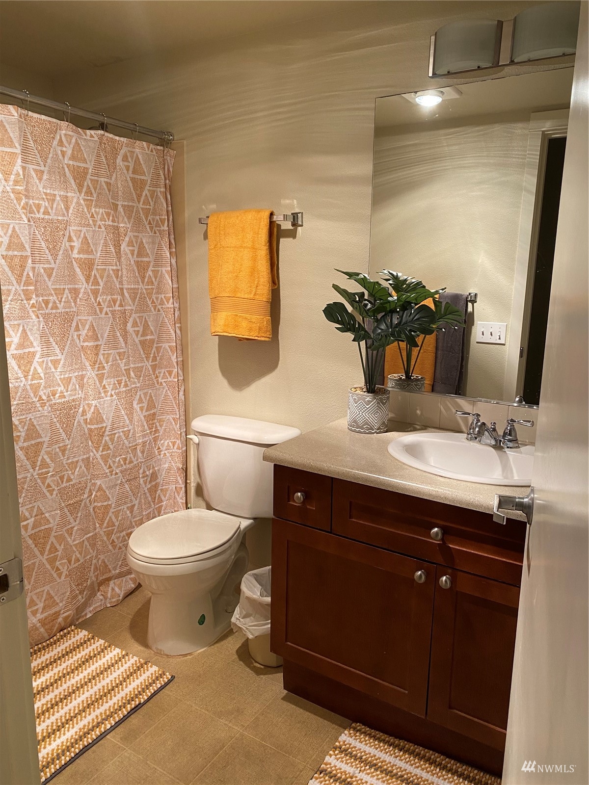 9805 Avondale Road Northeast, Unit X162 Redmond, WA 98052 - Photo 10 of 19 a bathroom with a sink and a mirror
