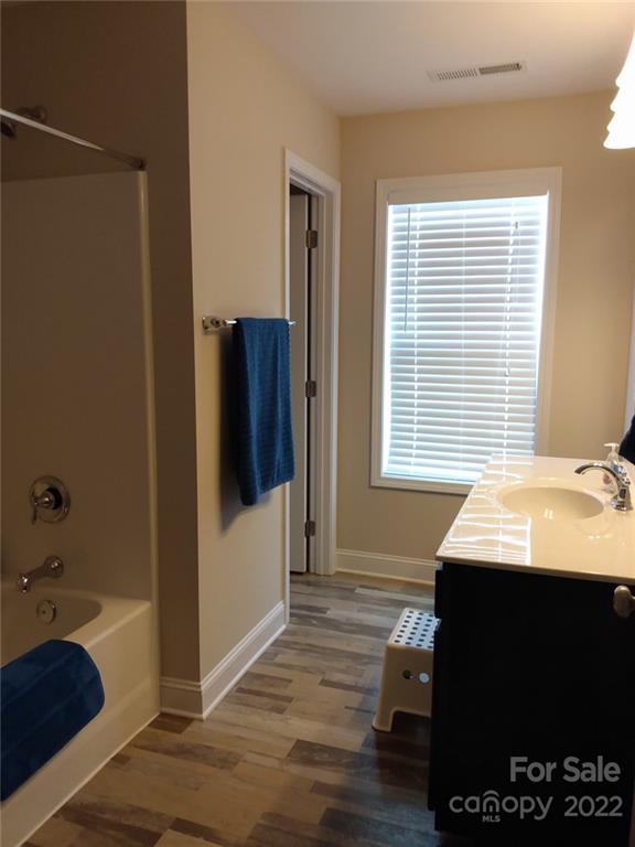 1114 Turtle Ridge Drive Monroe, NC 28110 - Photo 4 of 7 a bedroom with a bed and a window