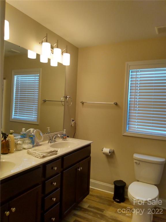 1114 Turtle Ridge Drive Monroe, NC 28110 - Photo 6 of 7 a bathroom with a sink and a mirror