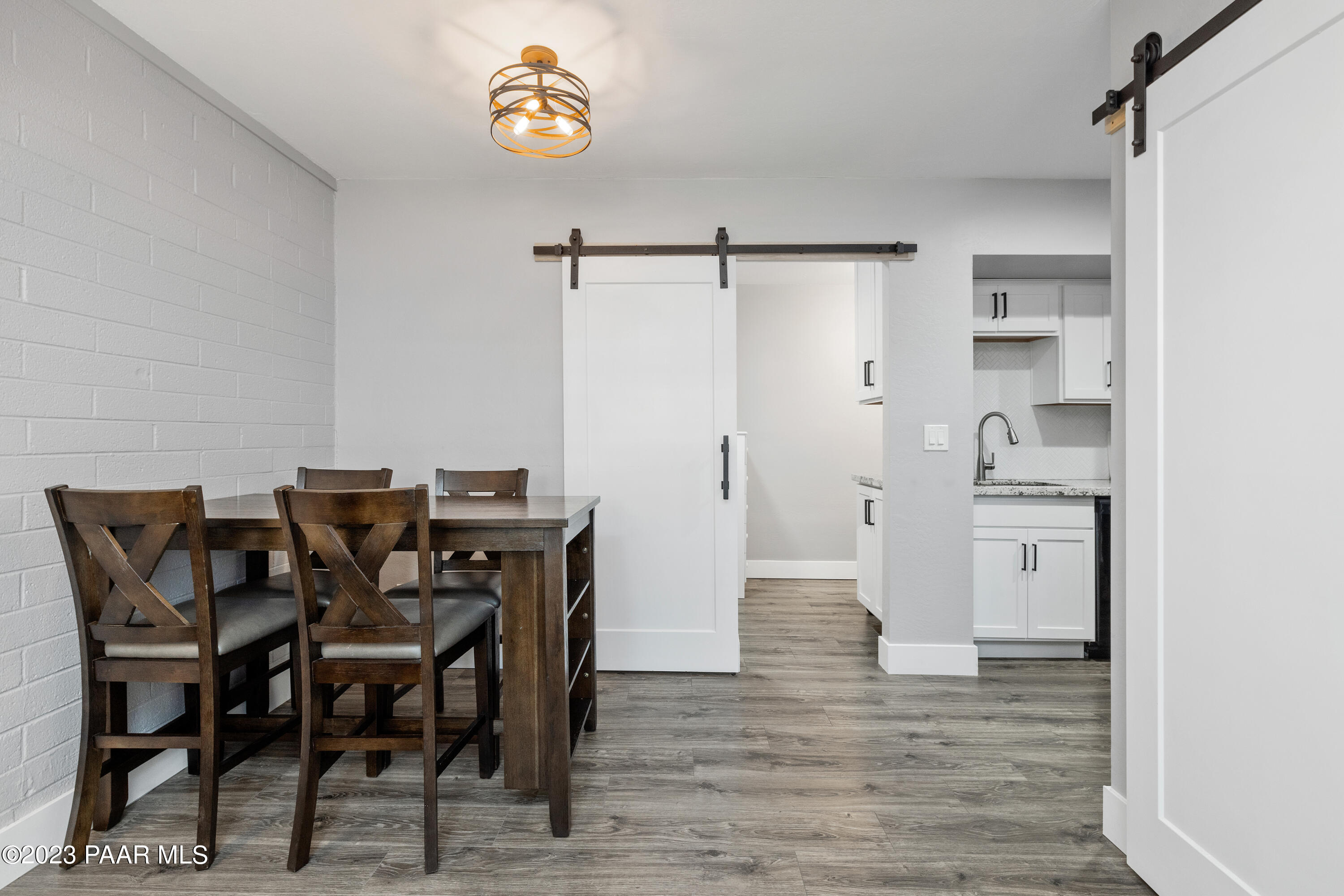 8339 Florentine Road, Unit 1 Prescott Valley, AZ 86314 - Photo 3 of 21 a view of a dining room with furniture