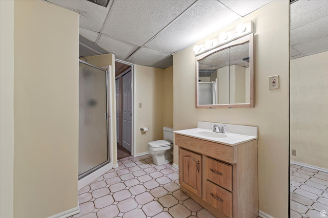 888 East 6895 South Midvale, UT 84047 - Photo 37 of 54 Full bathroom featuring a walk-in shower, vanity, and functional layout for everyday convenience.