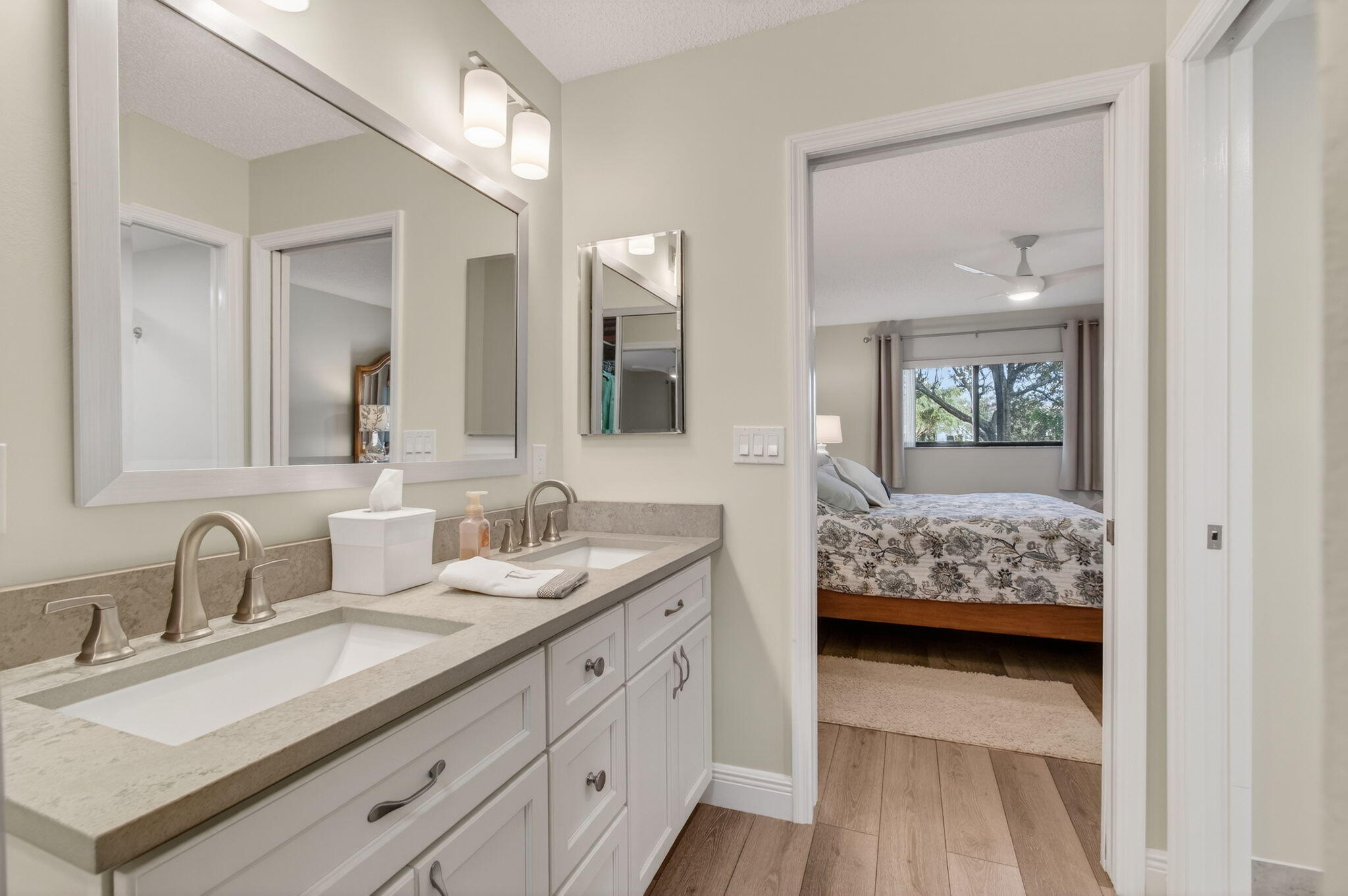 15074 Witney Road, Unit 204 Delray Beach, FL 33484 - Photo 36 of 56 a en suite bathroom with double sink and a mirror