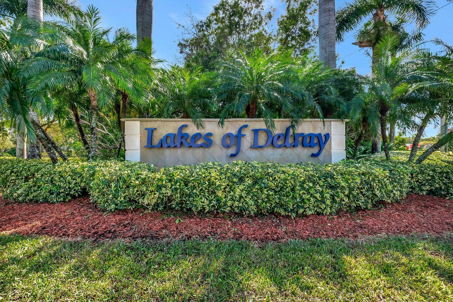 15074 Witney Road, Unit 204 Delray Beach, FL 33484 - Photo 46 of 56 a sign on the side of the road