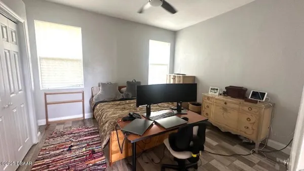 a workspace with furniture and window