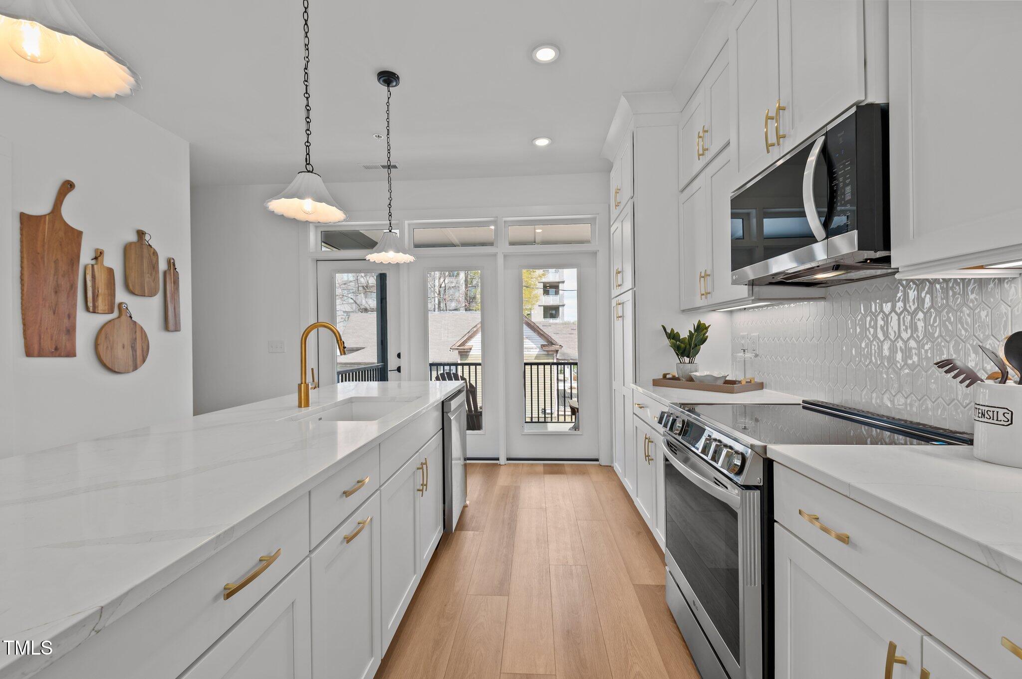 700 West North Street, Unit 101 Raleigh, NC 27603 - Photo 14 of 39 Gourmet Kitchen