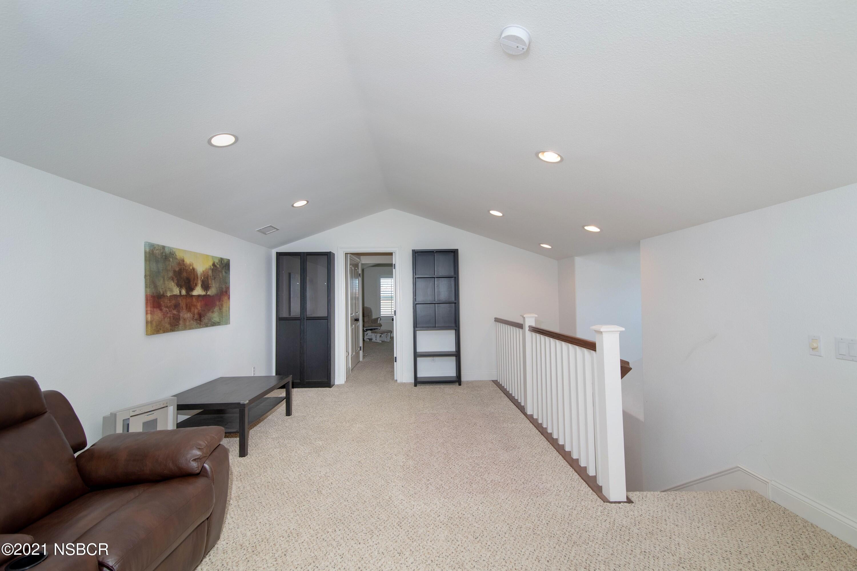 3709 Jupiter Avenue Lompoc, CA 93436 - Photo 20 of 26 a living room with furniture and a window