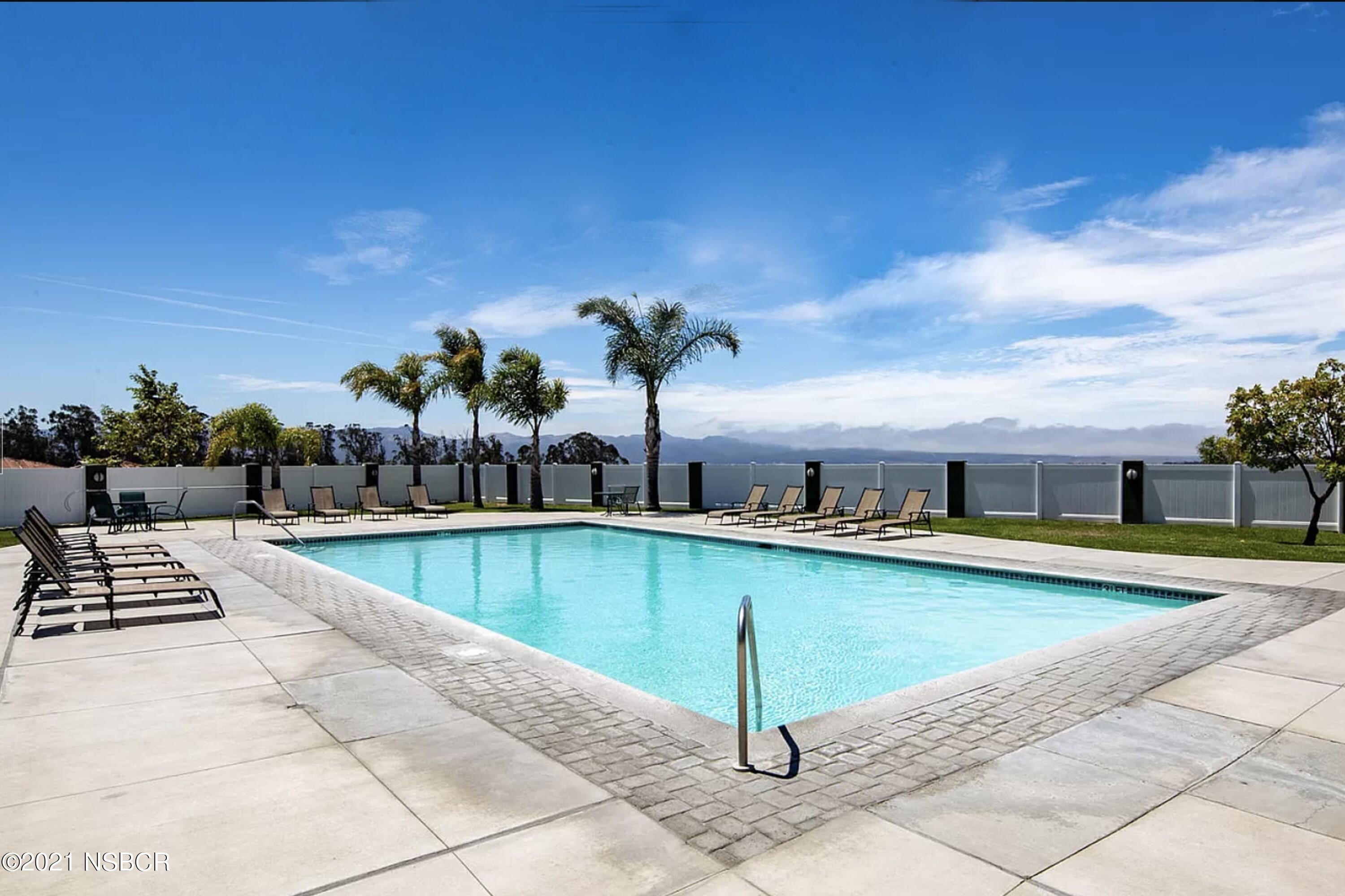 3709 Jupiter Avenue Lompoc, CA 93436 - Photo 25 of 26 a view of a swimming pool with a lounge chair