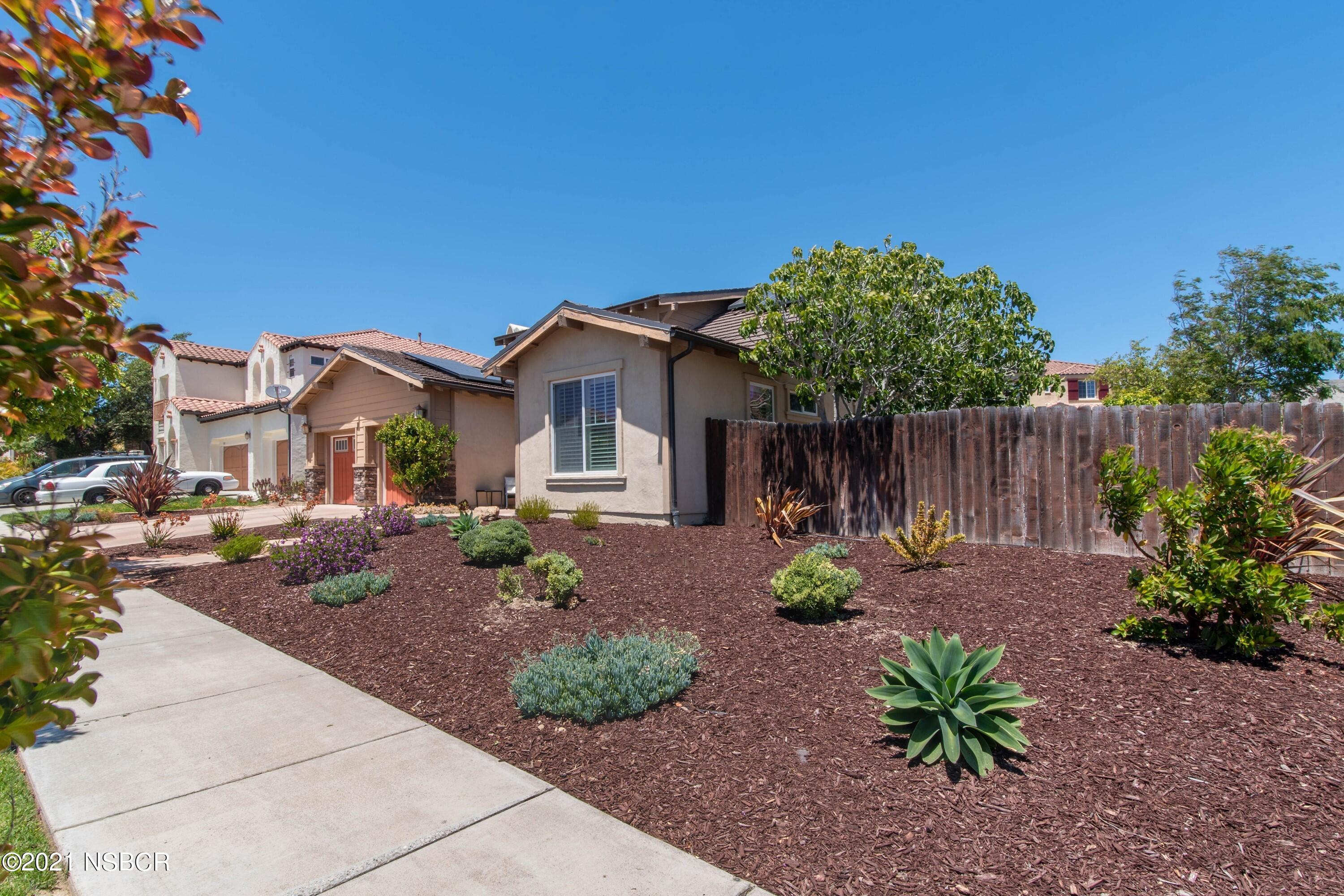 3709 Jupiter Avenue Lompoc, CA 93436 - Photo 3 of 26 a view of a house with a yard and sitting area