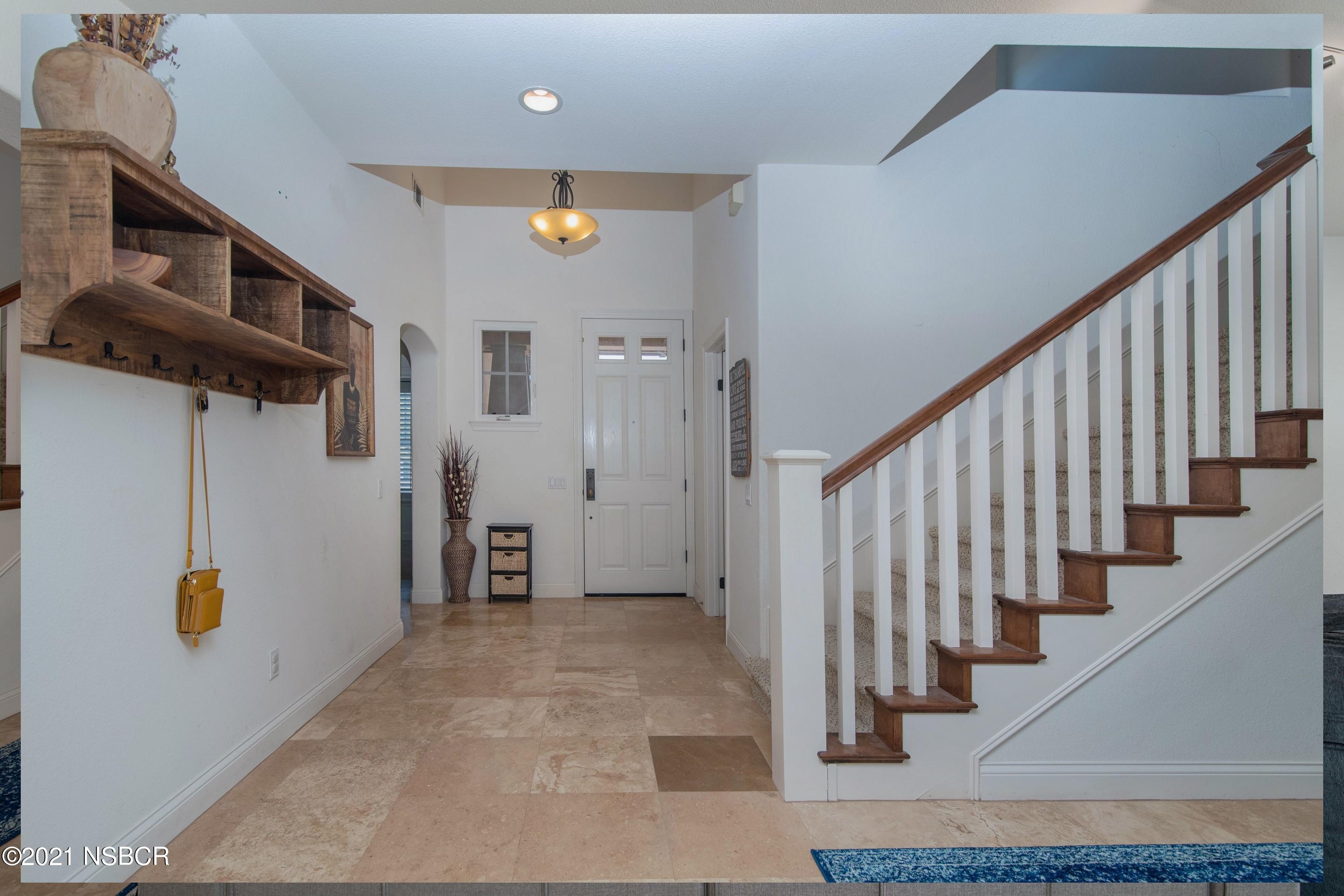 3709 Jupiter Avenue Lompoc, CA 93436 - Photo 7 of 26 a view of an entryway with staircase