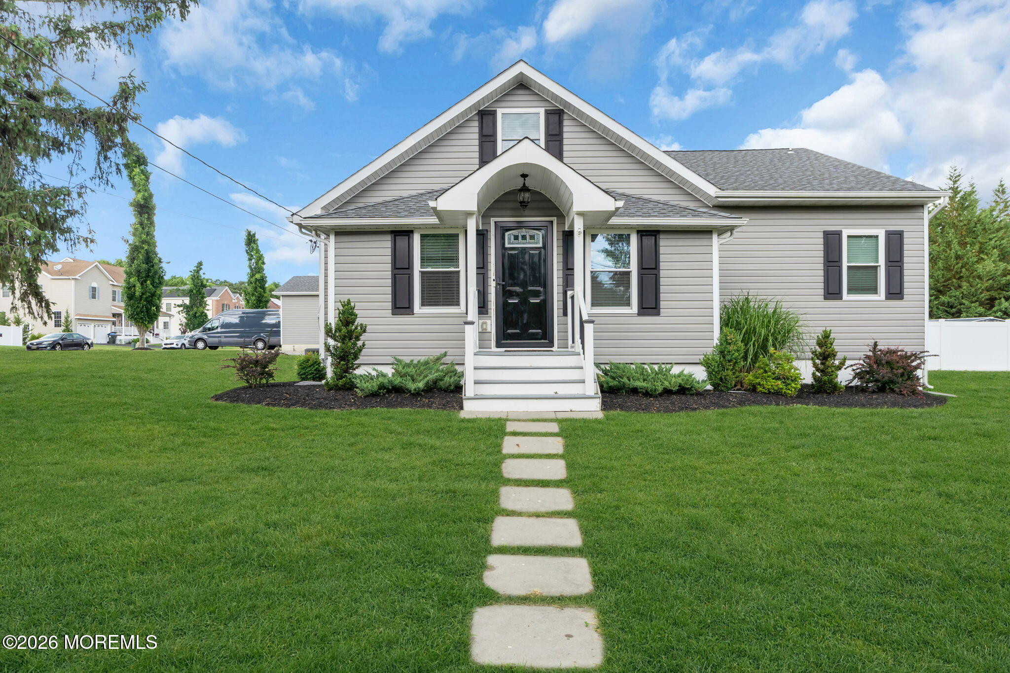 181 Locust Avenue Howell, NJ 07731 - Photo 2 of 66 a front view of a house with a yard