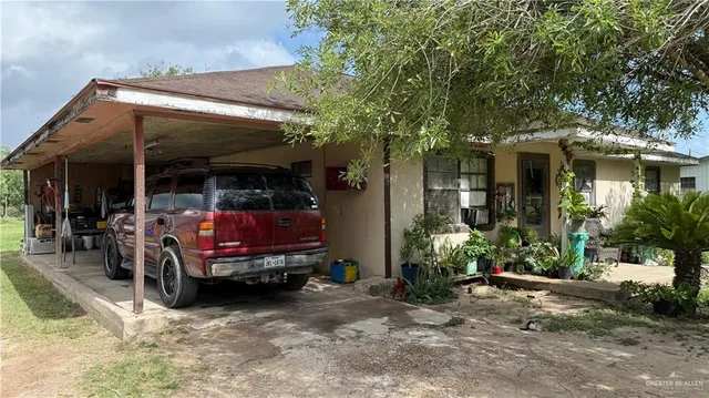 a front view of a house with wooden floor