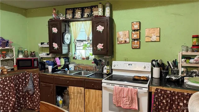 a room with furniture and a fan