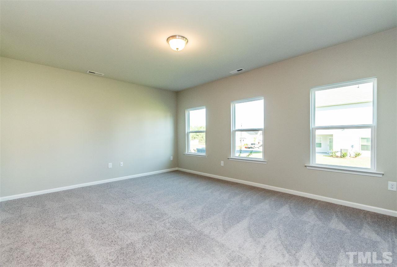 6818 Resting Grove Road, Unit 108 Raleigh, NC 27610 - Photo 14 of 24 A representative photo of a Braselton plan already built for demonstration purposes. New construction is under way.