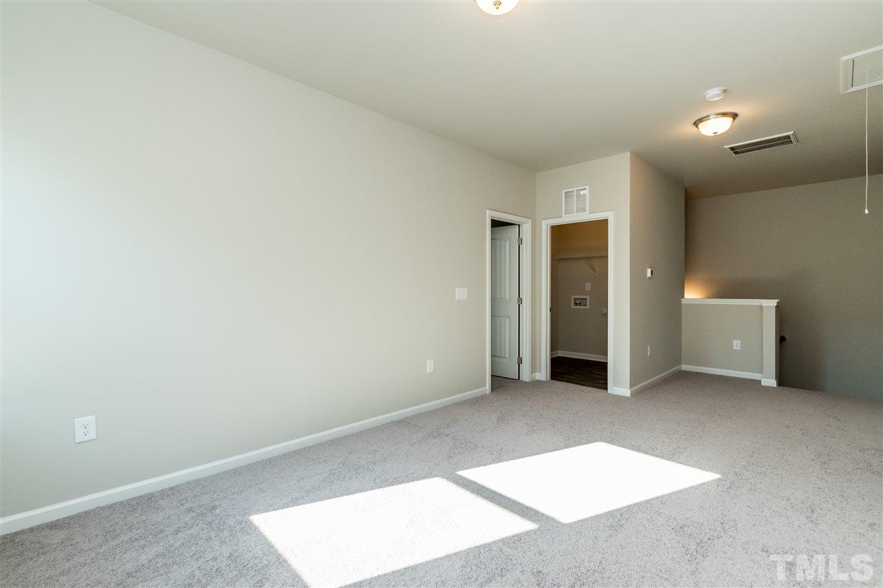 6818 Resting Grove Road, Unit 108 Raleigh, NC 27610 - Photo 15 of 24 A representative photo of a Braselton plan already built for demonstration purposes. New construction is under way.