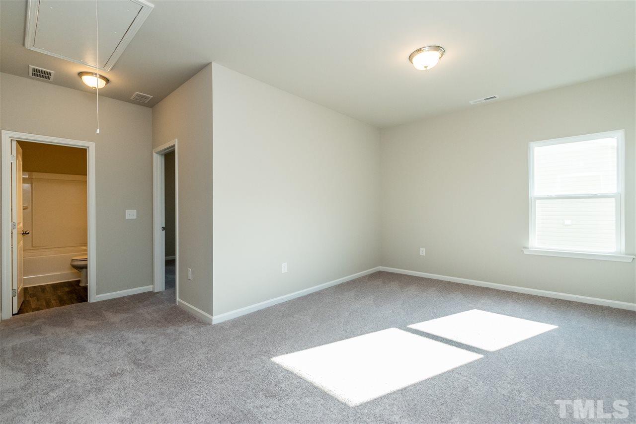 6818 Resting Grove Road, Unit 108 Raleigh, NC 27610 - Photo 16 of 24 A representative photo of a Braselton plan already built for demonstration purposes. New construction is under way.