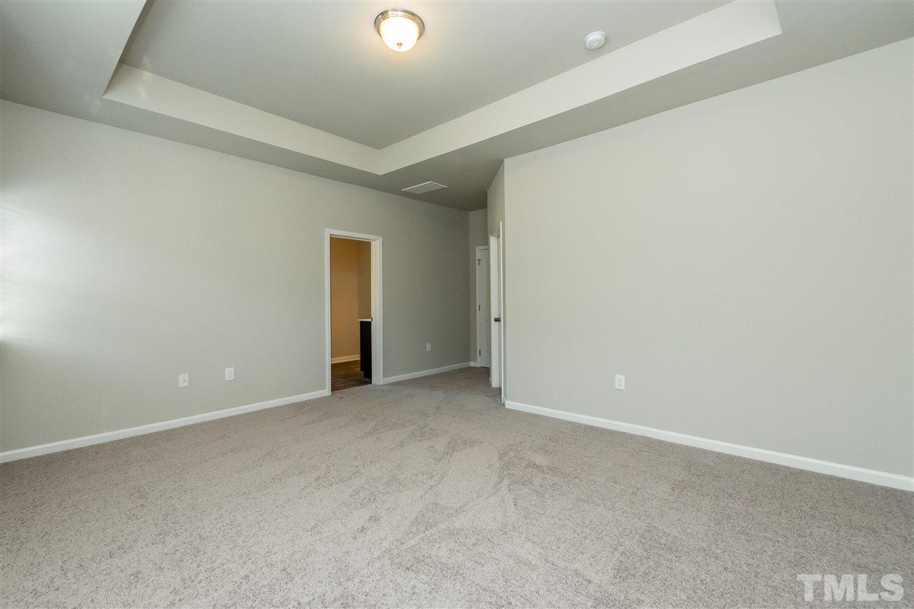 6818 Resting Grove Road, Unit 108 Raleigh, NC 27610 - Photo 17 of 24 A representative photo of a Braselton plan already built for demonstration purposes. New construction is under way.