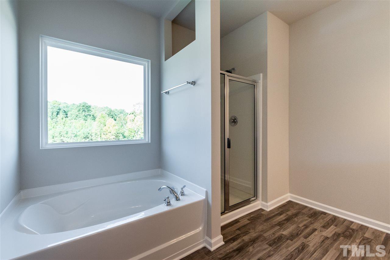 6818 Resting Grove Road, Unit 108 Raleigh, NC 27610 - Photo 19 of 24 A representative photo of a Braselton plan already built for demonstration purposes. New construction is under way.