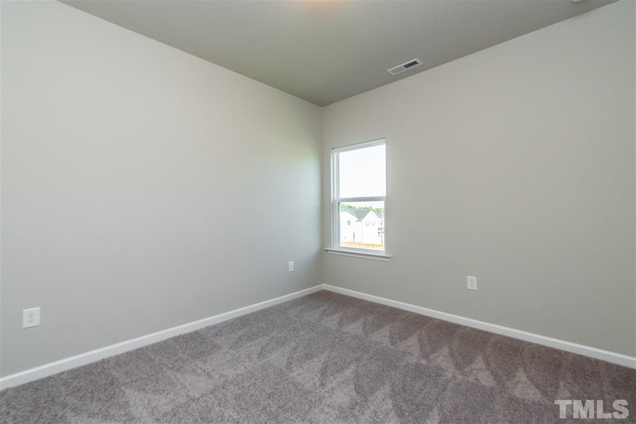 6818 Resting Grove Road, Unit 108 Raleigh, NC 27610 - Photo 21 of 24 A representative photo of a Braselton plan already built for demonstration purposes. New construction is under way.