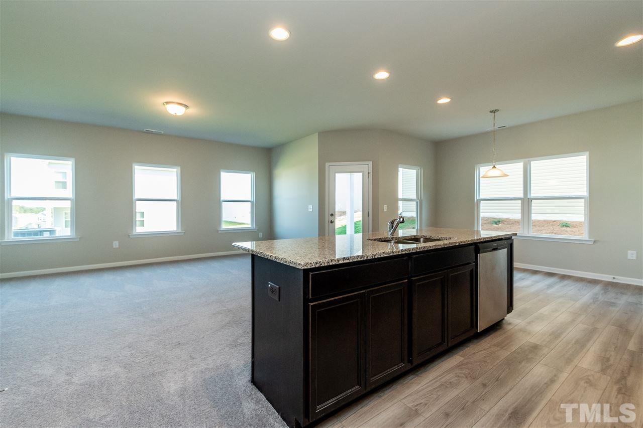 6818 Resting Grove Road, Unit 108 Raleigh, NC 27610 - Photo 6 of 24 A representative photo of a Braselton plan already built for demonstration purposes. New construction is under way.