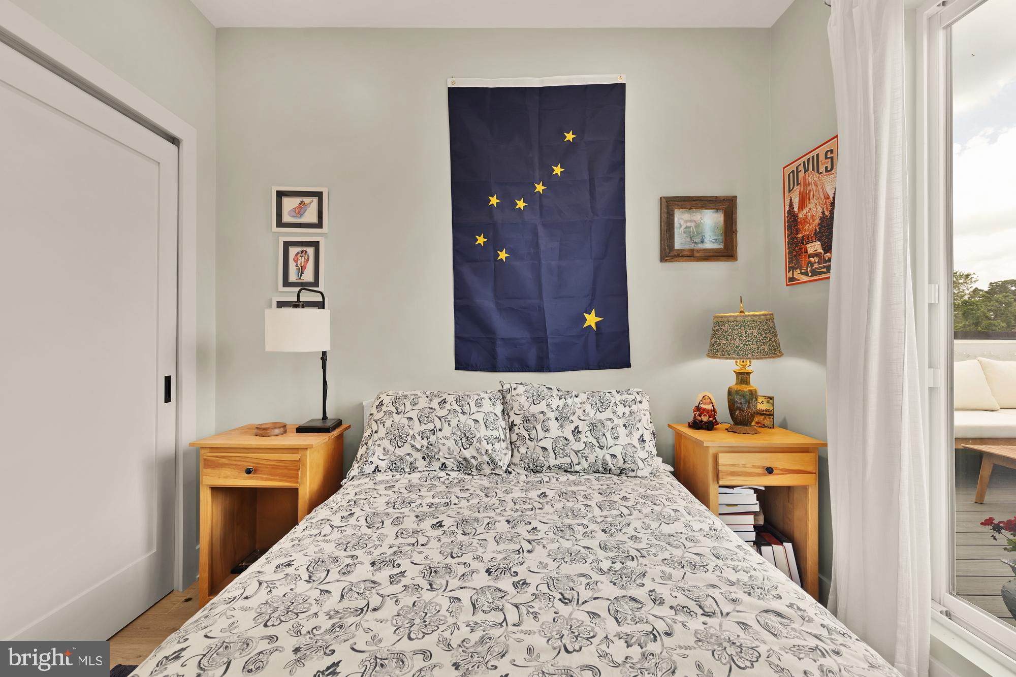 623 Kennedy Street Northwest, Unit 10 Washington, DC 20011 - Photo 18 of 29 a bedroom with a bed and a couch