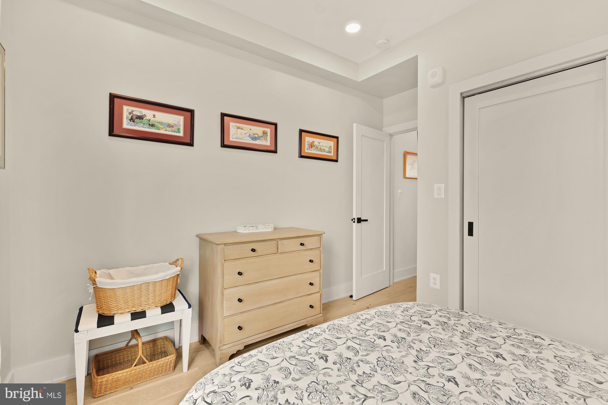 623 Kennedy Street Northwest, Unit 10 Washington, DC 20011 - Photo 19 of 29 a view of a bedroom with cabinet and bed