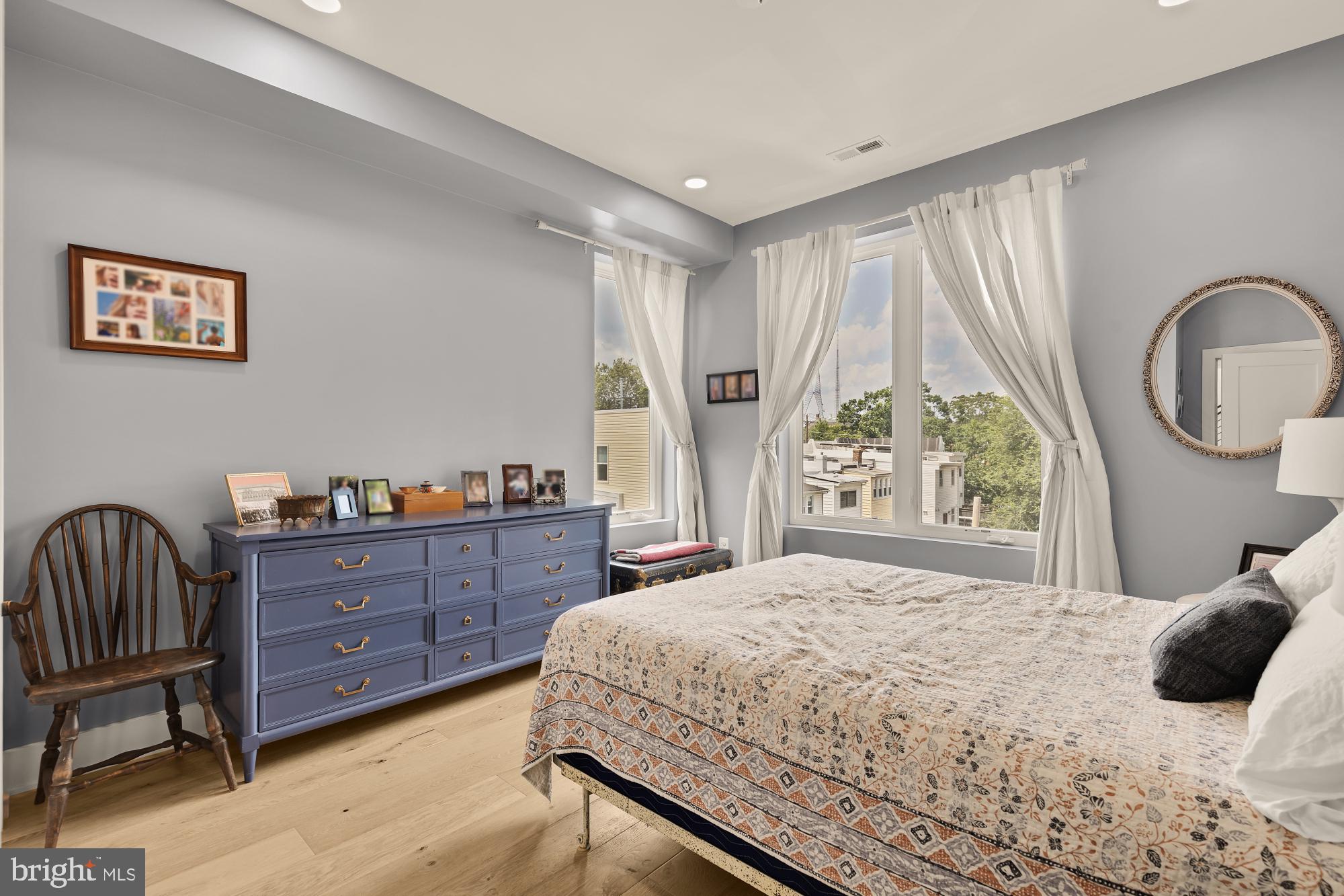 623 Kennedy Street Northwest, Unit 10 Washington, DC 20011 - Photo 20 of 29 a bedroom with a bed and a window