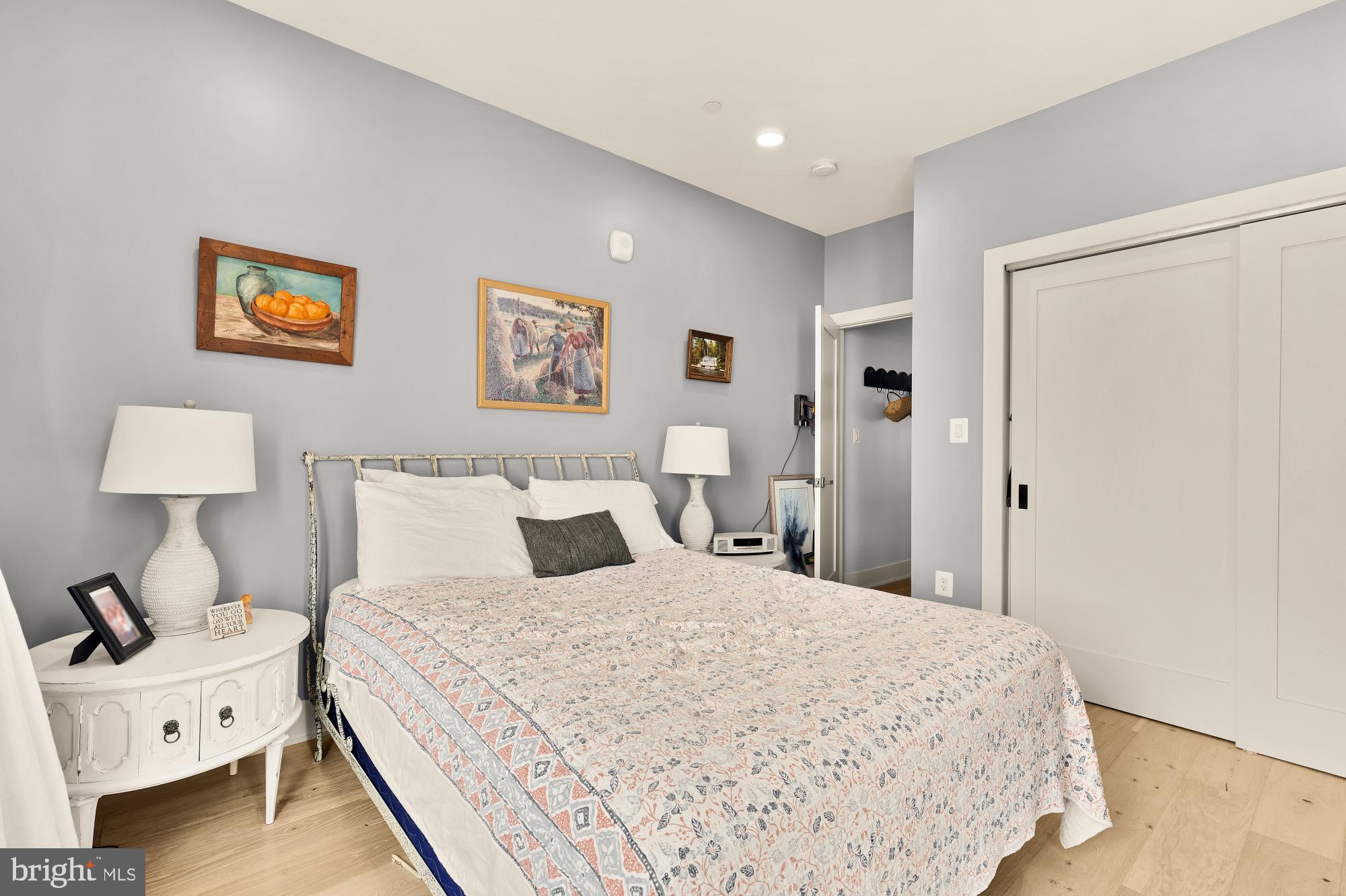 623 Kennedy Street Northwest, Unit 10 Washington, DC 20011 - Photo 22 of 29 a bedroom with a bed and a lamp