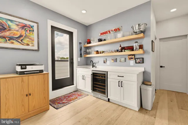 a kitchen with stainless steel appliances a stove and a refrigerator