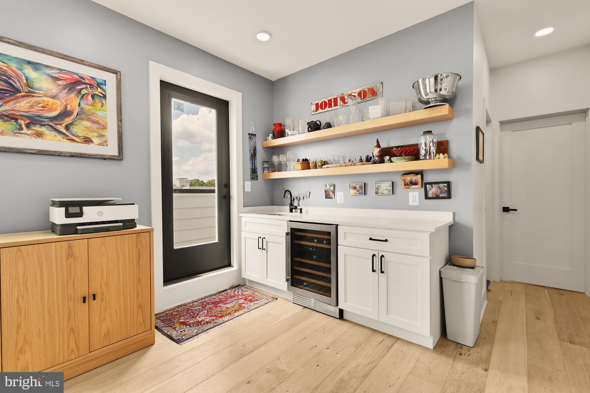 623 Kennedy Street Northwest, Unit 10 Washington, DC 20011 - Photo 24 of 29 a kitchen with stainless steel appliances a stove and a refrigerator
