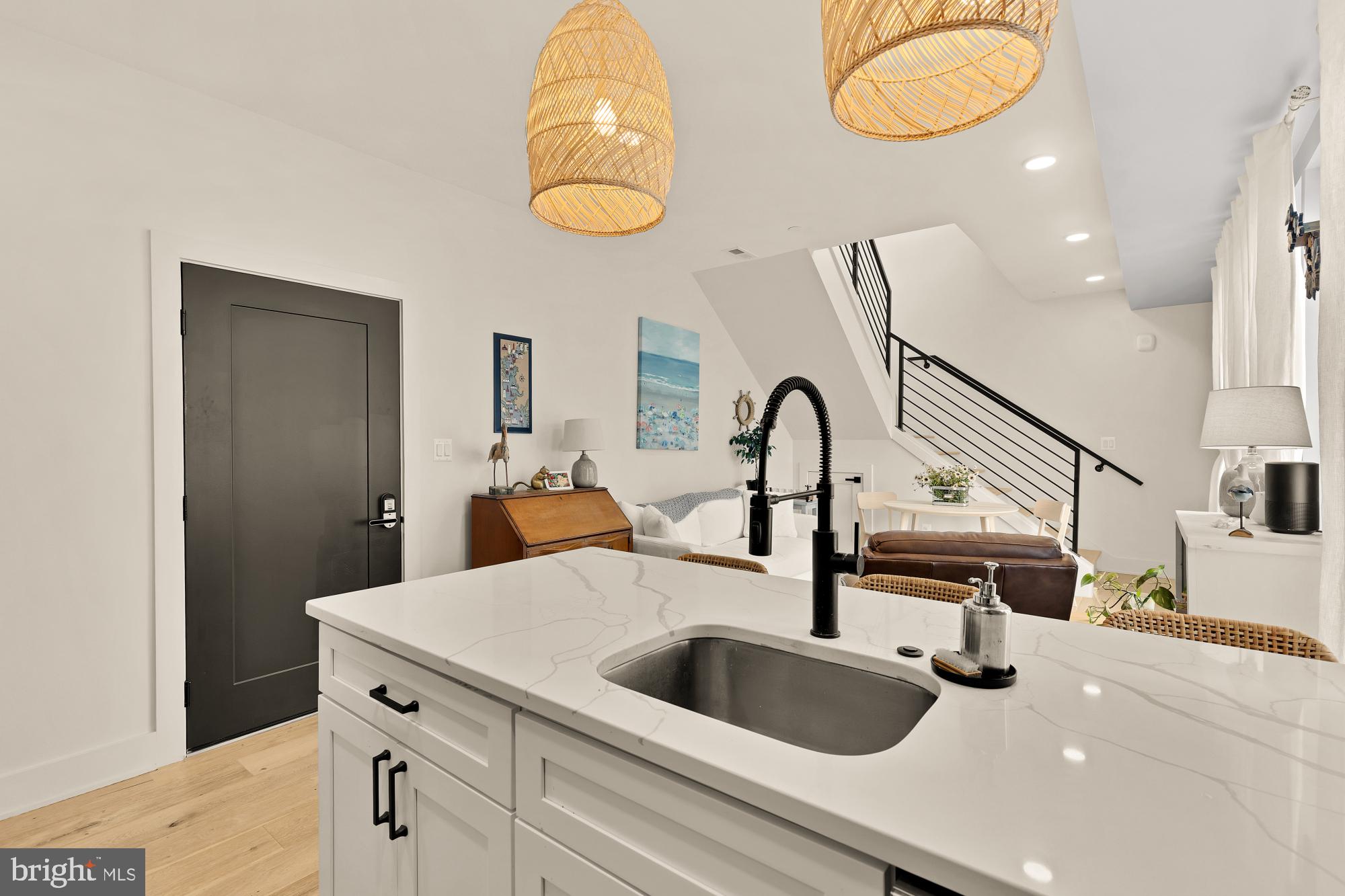 623 Kennedy Street Northwest, Unit 10 Washington, DC 20011 - Photo 10 of 29 a kitchen with sink a faucet and chairs