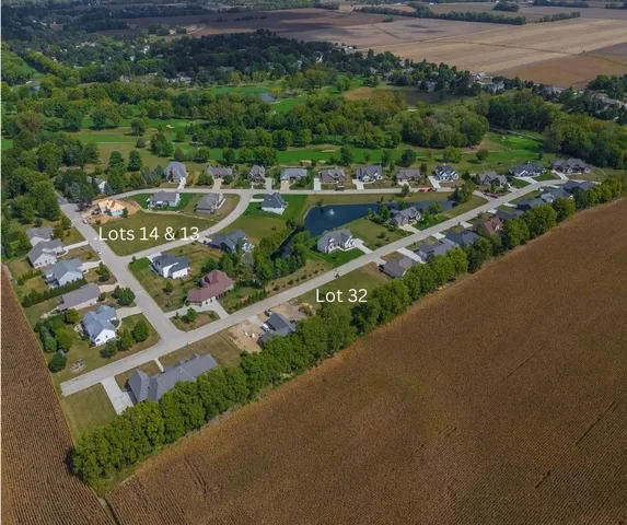 an aerial view of a house with a garden