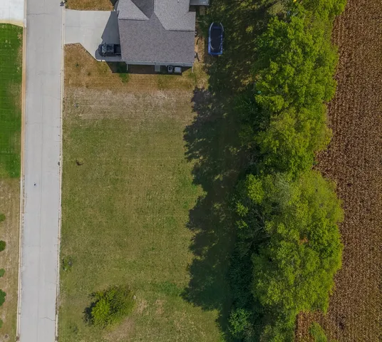 a view of a city with a lake