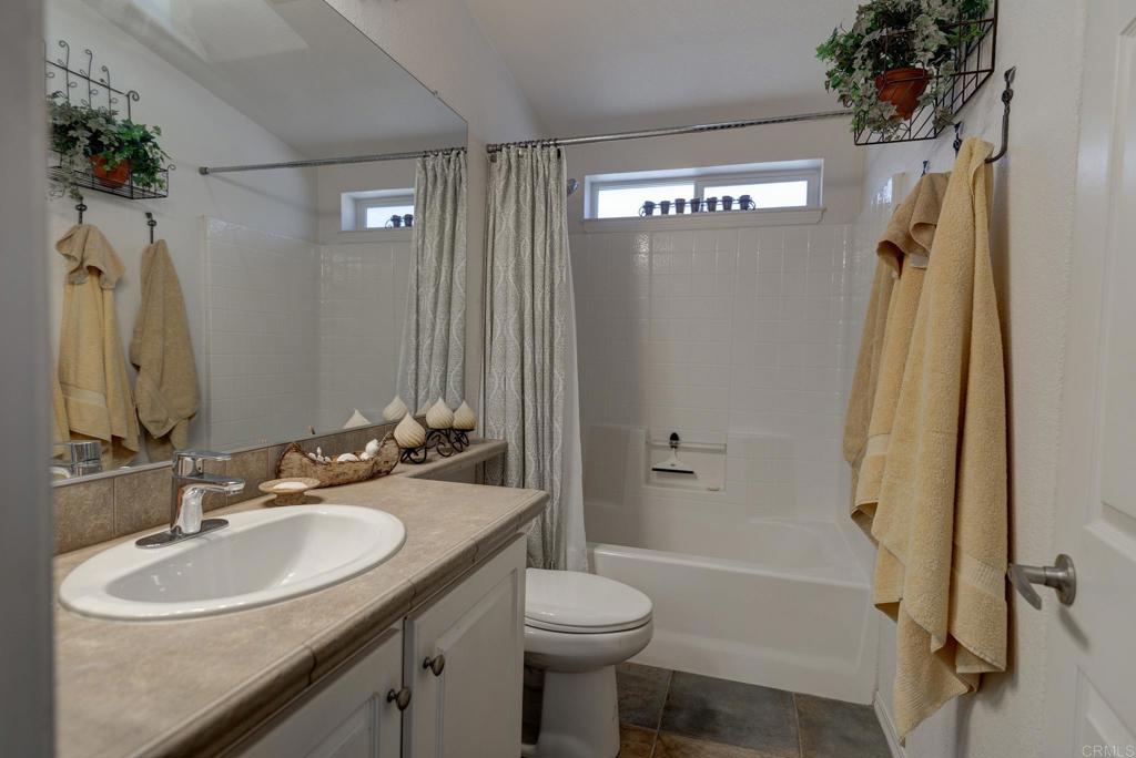1010 Palm Canyon Drive, Unit 368 Borrego Springs, CA 92004 - Photo 16 of 23 a bathroom with a sink a toilet and shower