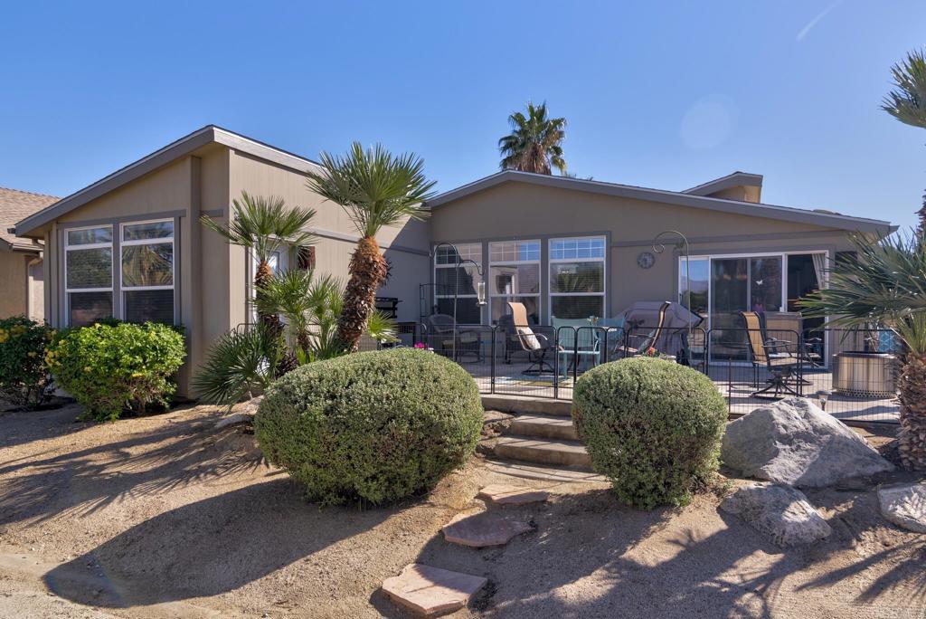 1010 Palm Canyon Drive, Unit 368 Borrego Springs, CA 92004 - Photo 17 of 23 a front view of a house with garden