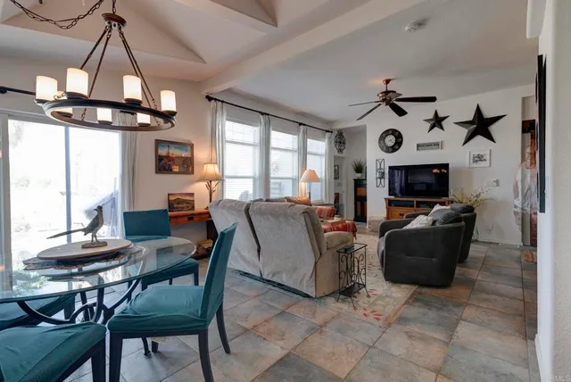 a view of a livingroom with furniture and window