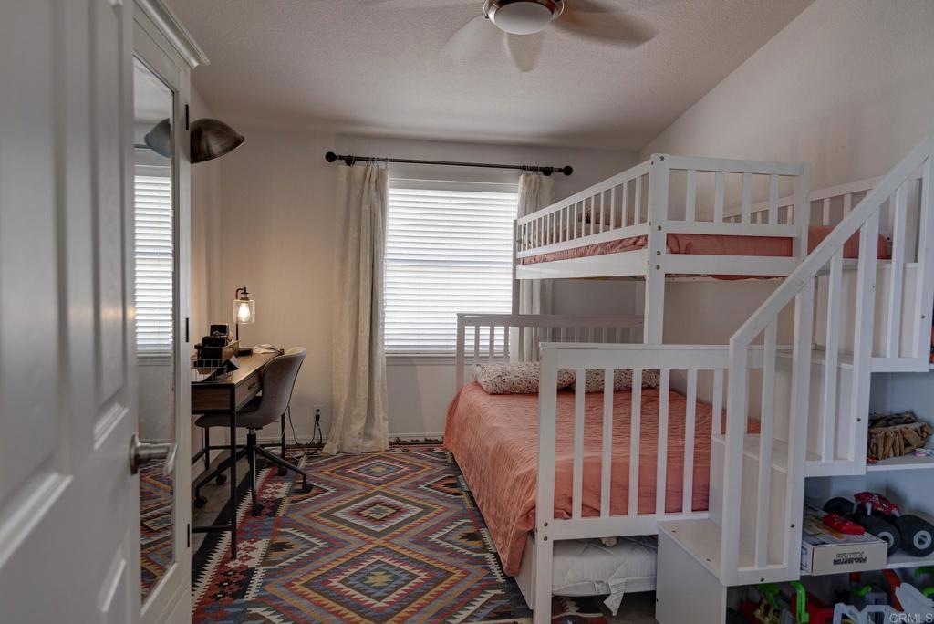 1010 Palm Canyon Drive, Unit 368 Borrego Springs, CA 92004 - Photo 10 of 23 a bedroom with furniture and a window