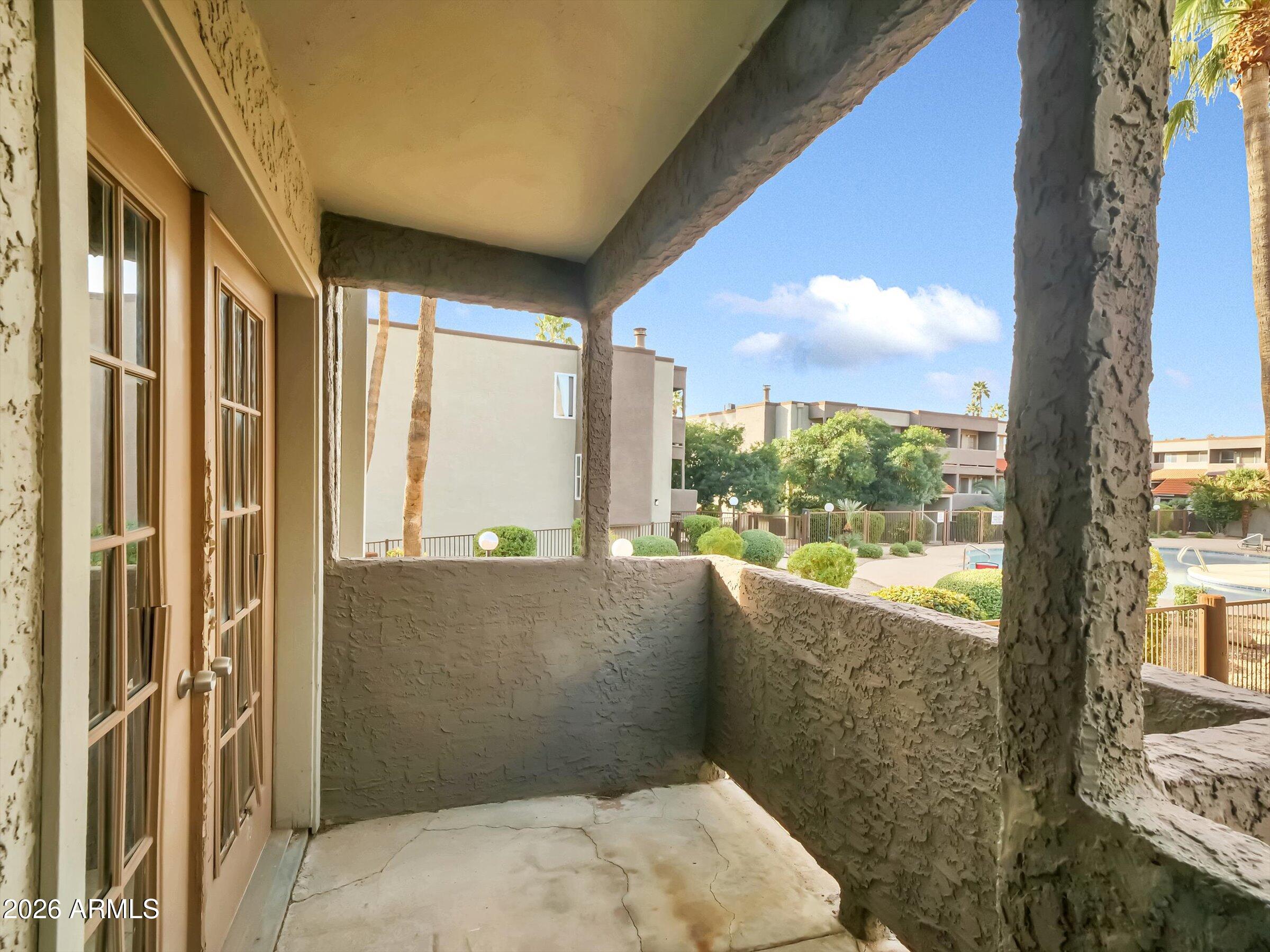 1645 West Baseline Road, Unit 2072 Mesa, AZ 85202 - Photo 35 of 37 a view of balcony with window