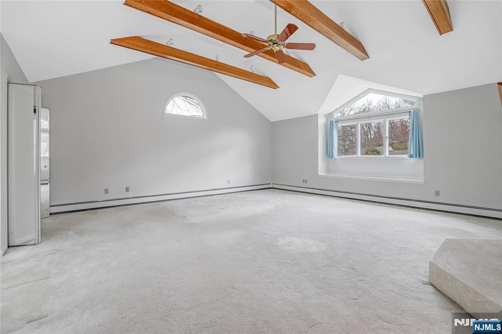 31 Collins Avenue Closter, NJ 07624 - Photo 15 of 37 an empty room with windows