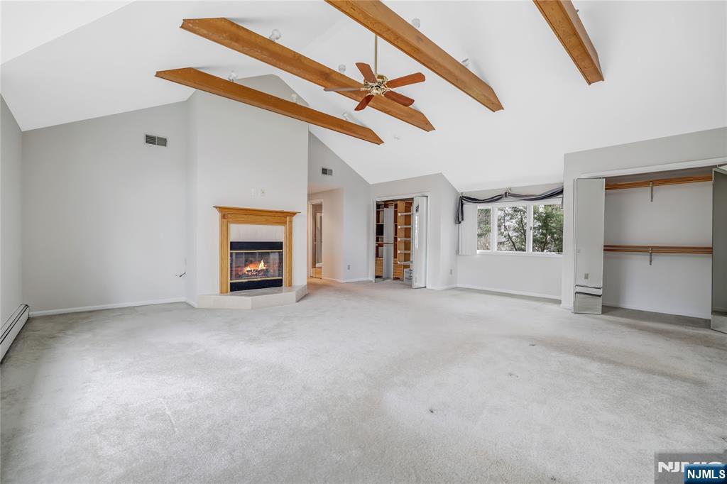31 Collins Avenue Closter, NJ 07624 - Photo 16 of 37 a view of an empty room with a window
