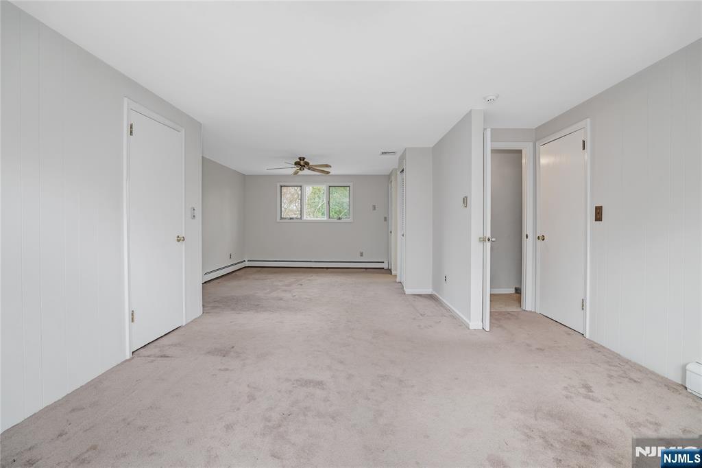 31 Collins Avenue Closter, NJ 07624 - Photo 21 of 37 a view of an empty room with a window
