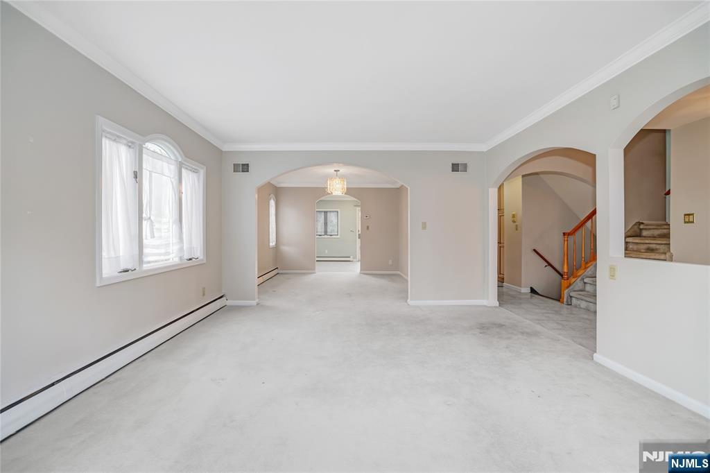 31 Collins Avenue Closter, NJ 07624 - Photo 3 of 37 a view of an empty room with a window