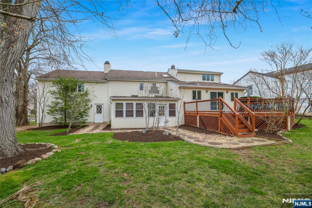 31 Collins Avenue Closter, NJ 07624 - Photo 31 of 37 front view of a house with a yard