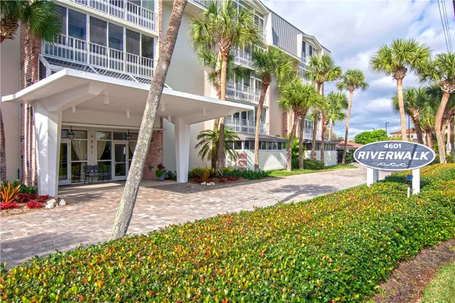 a front view of a building with garden