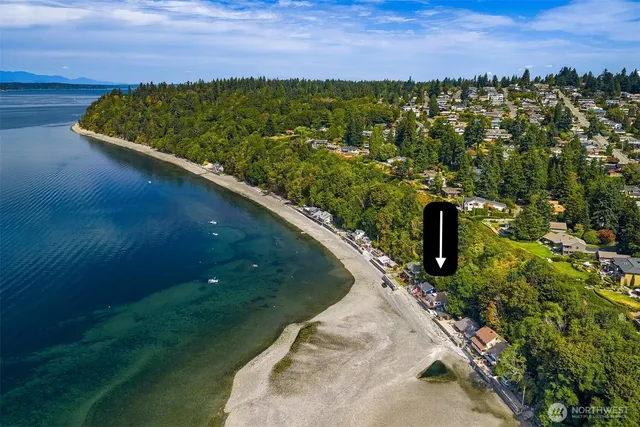 a view of a lake with a yard