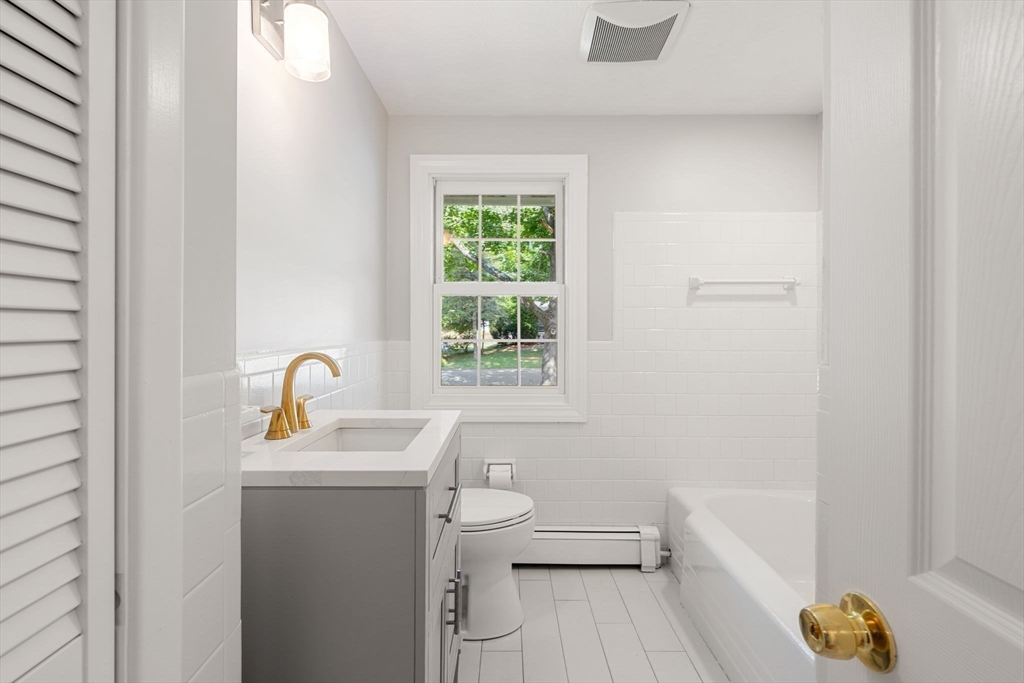 21 Savoy Road Framingham, MA 01701 - Photo 27 of 37 a bathroom with a sink toilet and tub