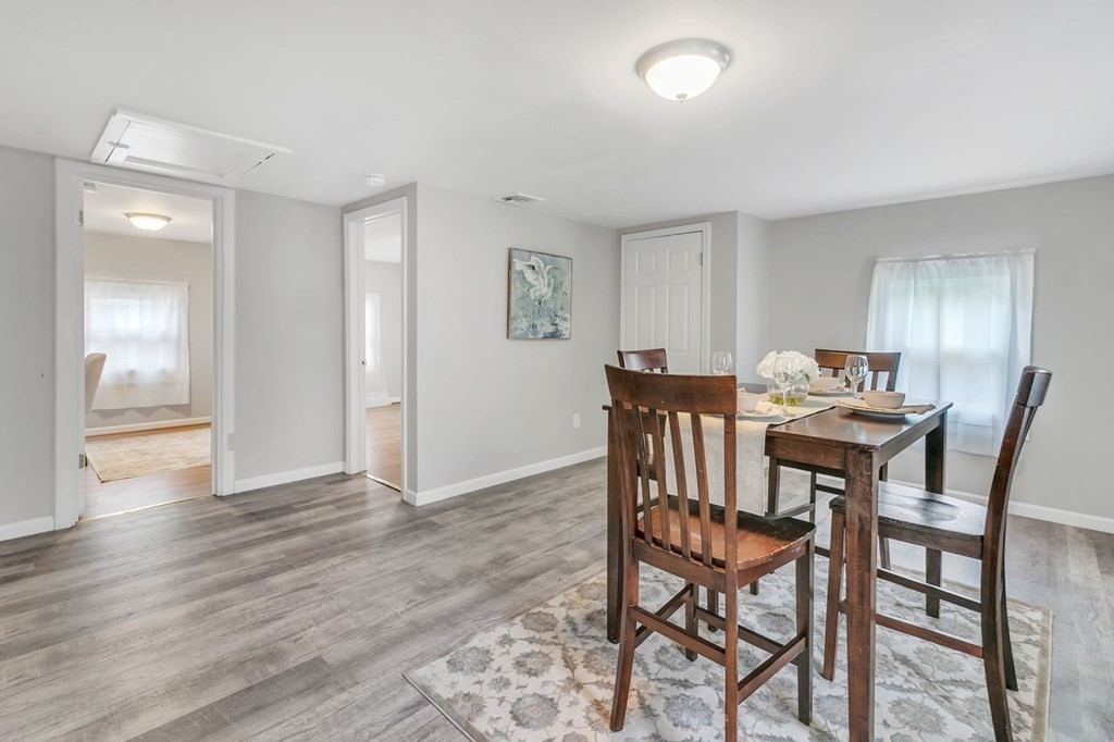 284 Ambrose Street Springfield, MA 01109 - Photo 16 of 29 a view of a dining room with furniture and wooden floor