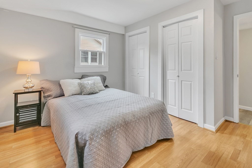 284 Ambrose Street Springfield, MA 01109 - Photo 17 of 29 a bedroom with a bed and a window